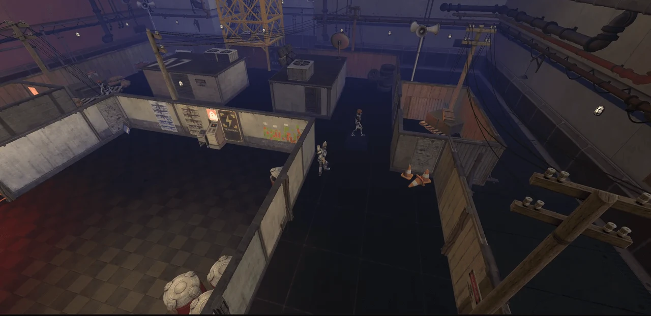 An overhead view of the stealth prototype’s industrial interior, with metal platforms and red lighting.